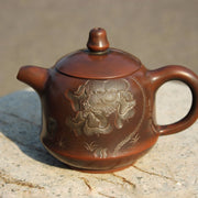 220ml Zizhong Nixing Teapot with Lotus Carving by Li Changquan and Characters by Qiu Yi Feng